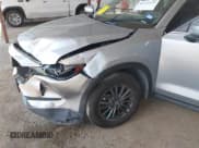 ✅ 2020 Mazda CX-5 Touring • VIN: JM3KFACM8L1770738 • Lot: 43237475. Wystawiony na IAAI z przebiegiem 96 169 mil. Bezpłatny archiwum sprzedaży aukcyjnych z USA i szczegółowy raport historii pojazdu na DreamBid. Zdjęcie 6.