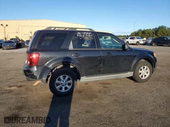 ✅ 2011 Mazda Tribute Sport • VIN: 4F2CY0C70BKM02624 • Lot: 75472464. Listed on Copart with 172,077 mi. Free auction sales archive from the USA and detailed vehicle history report at DreamBid. Image 3.