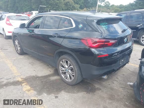 ✅ 2022 BMW X2 xDrive28i • VIN: WBXYJ1C0XN5U26633 • Lot: 43205146. Listed on IAAI with 59,859 mi. Free auction sales archive from the USA and detailed vehicle history report at DreamBid. Image 3.