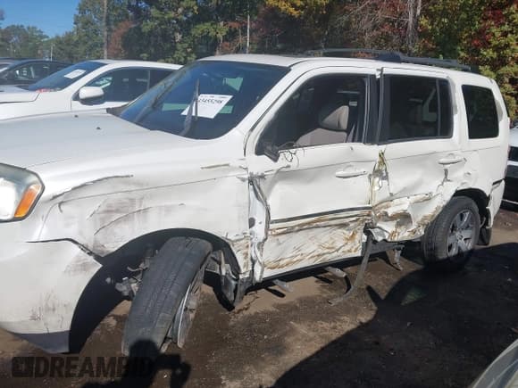 ✅ 2013 Honda Pilot Touring • VIN: 5FNYF4H92DB022116 • Lot: 43455298. Listed on IAAI with 142,442 mi. Free auction sales archive from the USA and detailed vehicle history report at DreamBid. Image 6.