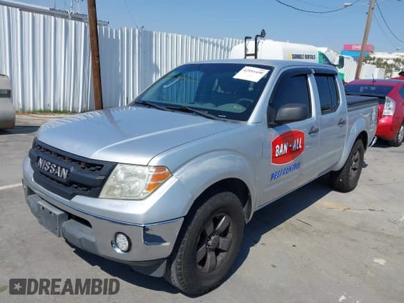 ✅ 2010 Nissan Frontier SE • VIN: 1N6AD0ER5AC447971 • Лот: 42951450. Опубликован ранее на IAAI с пробегом 424 690 миль. Бесплатный доступ к архиву аукционных продаж из США и подробный отчёт об истории автомобиля на DreamBid. Изображение 2.