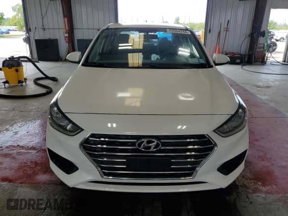 2019 Hyundai Accent SE с VIN 3KPC24A38KE087020, выставлен на аукционе Copart как лот 63064244 с пробегом 63 641 миль миль и Списание • Salvage title. История ставок и продаж доступна на DreamBid. Изображение 5.