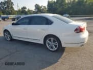 ✅ 2014 Volkswagen Passat SEL Premium • VIN: 1VWCN7A31EC035777 • Лот: 80261605. Опубликован ранее на Copart с пробегом 134 143 миль. Бесплатный доступ к архиву аукционных продаж из США и подробный отчёт об истории автомобиля на DreamBid. Изображение 2.