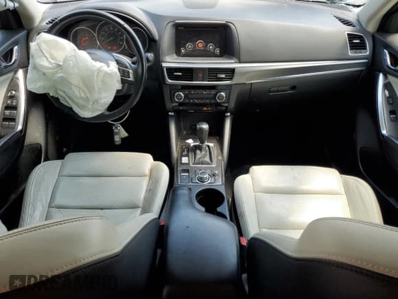 ✅ 2016 Mazda CX-5 Grand Touring • VIN: JM3KE4DY1G0885876 • Lot: 61382575. Listed on Copart with 124,491 mi. Free auction sales archive from the USA and detailed vehicle history report at DreamBid. Image 8.