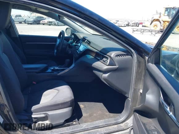 2019 Toyota Camry LE with VIN 4T1B11HK1KU185930, listed as a IAAI auction lot 43027742 with 151,805 mi miles and . Bid and sale history available at DreamBid. Image 5.