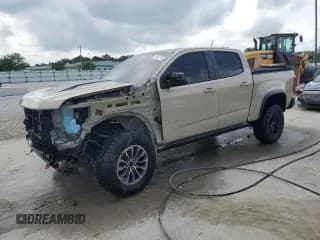 ✅ 2021 Chevrolet Colorado 4WD ZR2 • VIN: 1GCGTEEN6M1209010 • Лот: 62463765. Опубликован ранее на Copart с пробегом 45 992 миль. Бесплатный доступ к архиву аукционных продаж из США и подробный отчёт об истории автомобиля на DreamBid. Изображение 1.