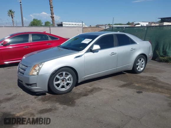 ✅ 2009 Cadillac CTS RWD • VIN: 1G6DU57VX90143820 • Lot: 42450086. Wystawiony na IAAI z przebiegiem 170 656 mil. Bezpłatny archiwum sprzedaży aukcyjnych z USA i szczegółowy raport historii pojazdu na DreamBid. Zdjęcie 2.