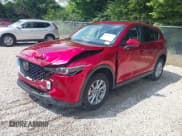 ✅ 2023 Mazda CX-5 S Carbon Edition • VIN: JM3KFBCM4P0239778 • Lot: 42856157. Listed on IAAI with 17,778 mi. Free auction sales archive from the USA and detailed vehicle history report at DreamBid. Image 2.