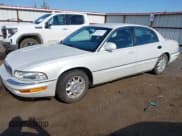 ✅ 2000 Buick Park Avenue Ultra • VIN: 1G4CU5213Y4127037 • Lot: 42754385. Listed on IAAI with 214,595 mi. Free auction sales archive from the USA and detailed vehicle history report at DreamBid. Image 2.