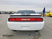 ✅ 2011 Dodge Challenger • VIN: 2B3CJ4DG3BH601959 • Lot: 50878465. Wystawiony na Copart z przebiegiem 243 984 mil. Bezpłatny archiwum sprzedaży aukcyjnych z USA i szczegółowy raport historii pojazdu na DreamBid. Zdjęcie 6.