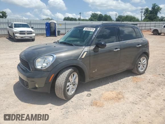 ✅ 2014 MINI Countryman S • VIN: WMWZC5C58EWP35183 • Lot: 62022875. Listed on Copart with 85,571 mi. Free auction sales archive from the USA and detailed vehicle history report at DreamBid. Image 1.