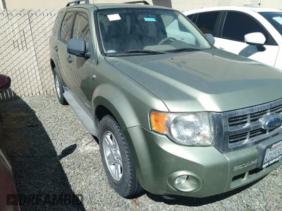 ✅ 2008 Ford Escape Hybrid • VIN: 1FMCU49H88KD08272 • Lot: 43253851. Listed on IAAI with 183,742 mi. Free auction sales archive from the USA and detailed vehicle history report at DreamBid. Image 1.