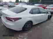 2022 Toyota Camry Hybrid XLE with VIN 4T1F31AK8NU575434, listed as a IAAI auction lot 41067498 with 11,052 mi miles and . Bid and sale history available at DreamBid. Image 4.