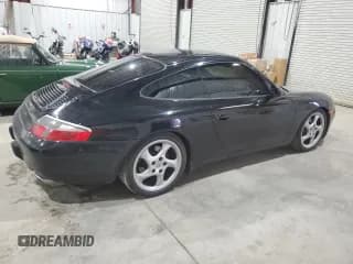 ✅ 1999 Porsche 911 • VIN: WP0AA2994XS625367 • Lot: 84816015. Wystawiony na Copart z przebiegiem 71 329 mil. Bezpłatny archiwum sprzedaży aukcyjnych z USA i szczegółowy raport historii pojazdu na DreamBid. Zdjęcie 3.