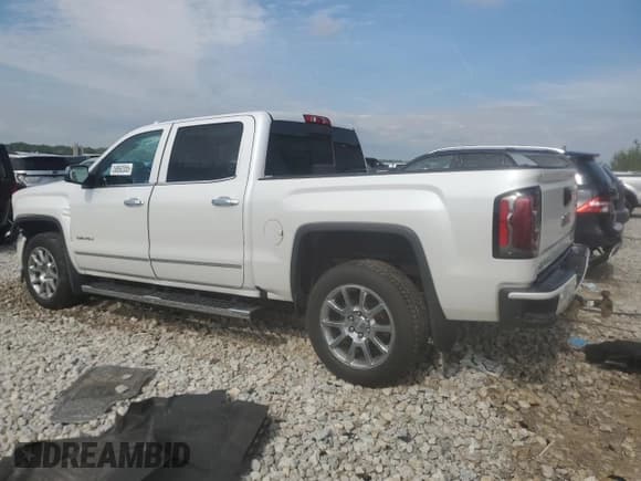 ✅ 2018 GMC Sierra 1500 Denali • VIN: 3GTU2PEC6JG487046 • Лот: 58692055. Опубликован ранее на Copart с пробегом 140 170 миль. Бесплатный доступ к архиву аукционных продаж из США и подробный отчёт об истории автомобиля на DreamBid. Изображение 2.