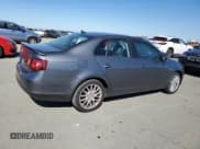 ✅ 2009 Volkswagen Jetta Wolfsburg Edition • VIN: 3VWRA71K39M076574 • Lot: 82267435. Listed on Copart with 141,187 mi. Free auction sales archive from the USA and detailed vehicle history report at DreamBid. Image 3.