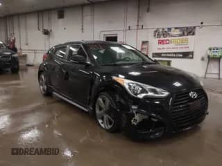 2015 Hyundai Veloster Turbo с VIN KMHTC6AE8FU239181, выставлен на аукционе IAAI как лот 43239248 с пробегом 59 523 миль миль и . История ставок и продаж доступна на DreamBid. Изображение 1.