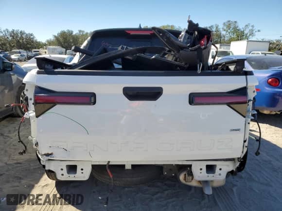 2022 Hyundai Santa Cruz SEL с VIN 5NTJCDAE6NH015496, выставлен на аукционе Copart как лот 81932034 с пробегом 42 131 миль миль и Списание • Salvage title. История ставок и продаж доступна на DreamBid. Изображение 6.