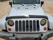 ✅ 2007 Jeep Wrangler Unlimited Sahara • VIN: 1J4GA59147L163936 • Lot: 58422655. Listed on Copart with 225,966 mi. Free auction sales archive from the USA and detailed vehicle history report at DreamBid. Image 12.