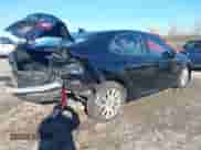 2019 Toyota Camry LE with VIN 4T1B11HK1KU697946, listed as a IAAI auction lot 43424429 with 289,881 mi miles and . Bid and sale history available at DreamBid. Image 4.