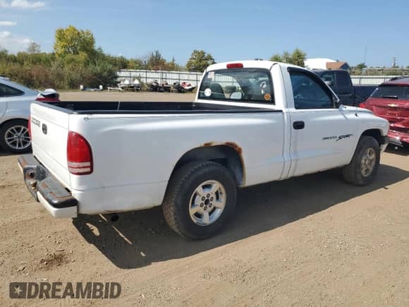 2001 Dodge Dakota z VIN 1B7FL26X91S132570, wystawiony jako Copart lot #72270094 z przebiegiem 118 842 mil mil oraz Szkoda całkowita • Salvage title. Historia ofert i sprzedaży dostępna na DreamBid. Obrazek 3.