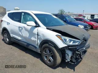✅ 2018 Hyundai Santa Fe 2.4L • VIN: 5XYZTDLB0JG563984 • Лот: 42492382. Опубликован ранее на IAAI с пробегом 57 832 миль. Бесплатный доступ к архиву аукционных продаж из США и подробный отчёт об истории автомобиля на DreamBid. Изображение 1.