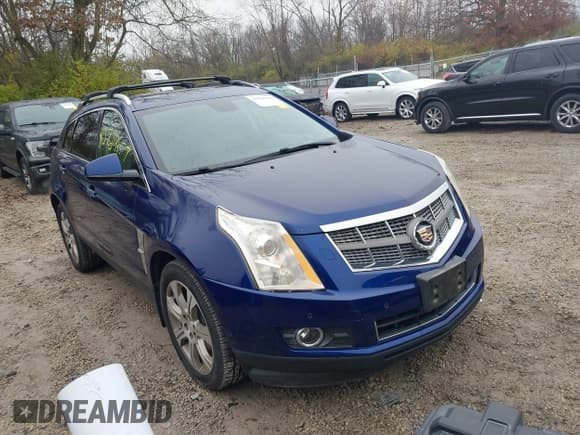 ✅ 2012 Cadillac SRX Performance Collection • VIN: 3GYFNEE35CS563080 • Lot: 43729157. Listed on IAAI with 125,490 mi. Free auction sales archive from the USA and detailed vehicle history report at DreamBid. Image 1.
