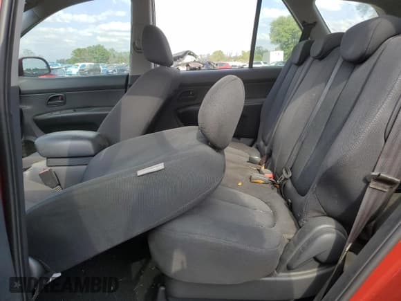 ✅ 2008 Kia Rondo LX • VIN: KNAFG525687165014 • Лот: 48962835. Опубликован ранее на Copart с пробегом 226 139 миль. Бесплатный доступ к архиву аукционных продаж из США и подробный отчёт об истории автомобиля на DreamBid. Изображение 11.