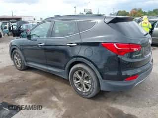 2014 Hyundai Santa Fe z VIN 5XYZU3LB0EG187445, wystawiony jako IAAI lot #43295530 z przebiegiem 117 959 mil mil oraz . Historia ofert i sprzedaży dostępna na DreamBid. Obrazek 3.