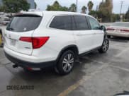✅ 2016 Honda Pilot EX-L • VIN: 5FNYF6H57GB051463 • Lot: 43722512. Wystawiony na IAAI z przebiegiem 64 289 mil. Bezpłatny archiwum sprzedaży aukcyjnych z USA i szczegółowy raport historii pojazdu na DreamBid. Zdjęcie 4.