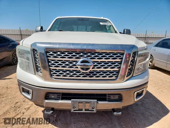 ✅ 2016 Nissan Titan Platinum Reserve • VIN: 1N6BA1F21GN502661 • Лот: 72023895. Опубликован ранее на Copart с пробегом 115 976 миль. Бесплатный доступ к архиву аукционных продаж из США и подробный отчёт об истории автомобиля на DreamBid. Изображение 5.