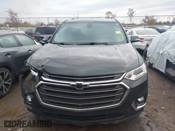 ✅ 2018 Chevrolet Traverse LT • VIN: 1GNEVHKW6JJ174682 • Lot: 43571283. Wystawiony na IAAI z przebiegiem 143 203 mil. Bezpłatny archiwum sprzedaży aukcyjnych z USA i szczegółowy raport historii pojazdu na DreamBid. Zdjęcie 12.