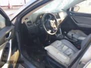 ✅ 2013 Mazda CX-5 Touring • VIN: JM3KE2CE1D0103888 • Lot: 43298744. Listed on IAAI with 305,966 mi. Free auction sales archive from the USA and detailed vehicle history report at DreamBid. Image 5.