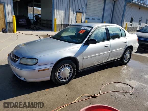 2001 Chevrolet Malibu with VIN 1G1ND52J716232051, listed as a Copart auction lot 79629054 with 194,455 mi miles and Salvage title. Bid and sale history available at DreamBid. Image 1.