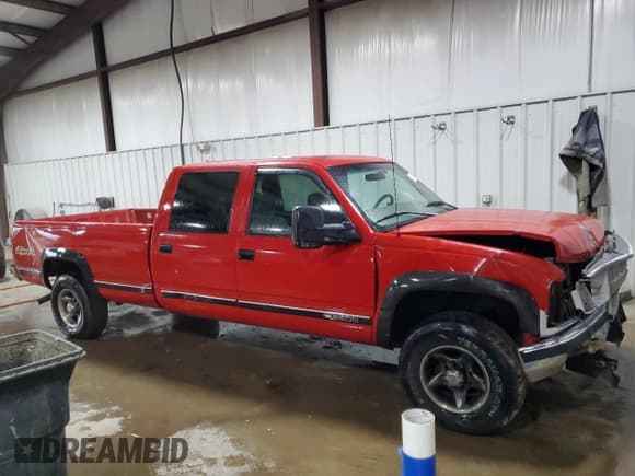 ✅ 1999 Chevrolet Silverado 3500 • VIN: 1GCHK33R3XF002759 • Lot: 87410485. Listed on Copart with 164,655 mi. Free auction sales archive from the USA and detailed vehicle history report at DreamBid. Image 4.