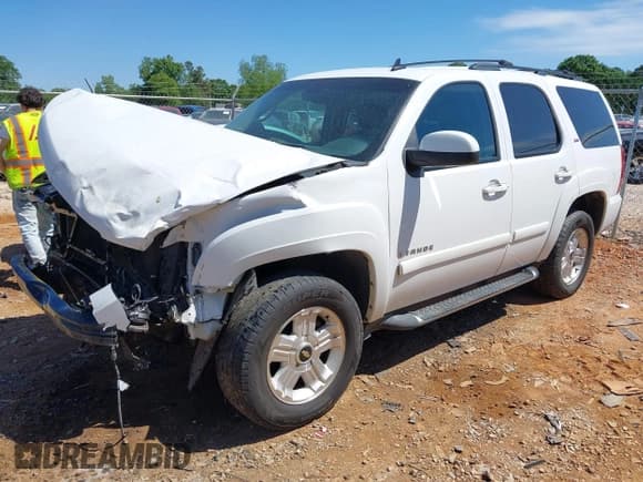 ✅ 2009 Chevrolet Tahoe 2LT • VIN: 1GNFC23029R161667 • Lot: 42135233. Wystawiony na IAAI z przebiegiem 288 292 mil. Bezpłatny archiwum sprzedaży aukcyjnych z USA i szczegółowy raport historii pojazdu na DreamBid. Zdjęcie 2.