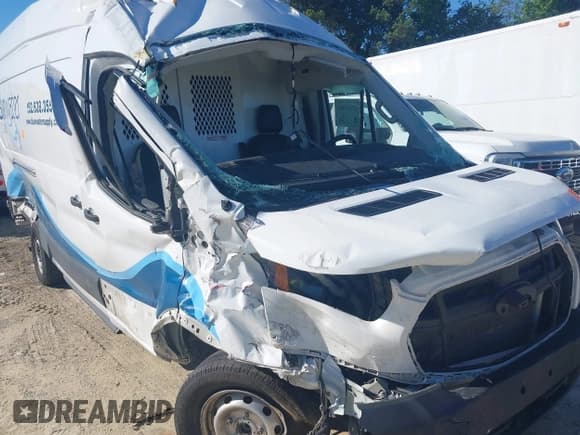 ✅ 2022 Ford Transit Cargo • VIN: 1FTBR3X81NKA63860 • Lot: 42323904. Listed on IAAI with 94,473 mi. Free auction sales archive from the USA and detailed vehicle history report at DreamBid. Image 14.