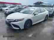 2022 Toyota Camry SE with VIN 4T1G11BK7NU047795, listed as a IAAI auction lot 42636810 with 59,439 mi miles and . Bid and sale history available at DreamBid. Image 2.