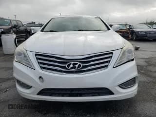 ✅ 2013 Hyundai Azera • VIN: KMHFG4JG8DA228669 • Лот: 62734185. Опубликован ранее на Copart с пробегом 148 611 миль. Бесплатный доступ к архиву аукционных продаж из США и подробный отчёт об истории автомобиля на DreamBid. Изображение 5.