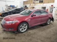 ✅ 2015 Ford Taurus SEL • VIN: 1FAHP2E87FG120943 • Lot: 84182074. Listed on Copart with 157,951 mi. Free auction sales archive from the USA and detailed vehicle history report at DreamBid. Image 1.