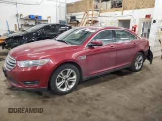 ✅ 2015 Ford Taurus SEL • VIN: 1FAHP2E87FG120943 • Лот: 84182074. Опубликован ранее на Copart с пробегом 157 951 миль. Бесплатный доступ к архиву аукционных продаж из США и подробный отчёт об истории автомобиля на DreamBid. Изображение 1.
