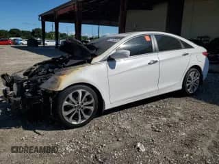 2013 Hyundai Sonata SE with VIN 5NPEC4AB0DH652257, listed as a Copart auction lot 82758505 with Not provided miles and Salvage title. Bid and sale history available at DreamBid. Image 1.