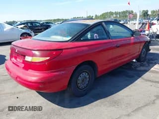 ✅ 1997 Saturn SC • VIN: 1G8ZF1280VZ261592 • Лот: 43468001. Опубликован ранее на IAAI с пробегом 220 986 миль. Бесплатный доступ к архиву аукционных продаж из США и подробный отчёт об истории автомобиля на DreamBid. Изображение 4.