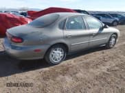 ✅ 1999 Ford Taurus SE • VIN: 1FAFP53U1XG314975 • Lot: 43888557. Wystawiony na IAAI z przebiegiem 109 373 mil. Bezpłatny archiwum sprzedaży aukcyjnych z USA i szczegółowy raport historii pojazdu na DreamBid. Zdjęcie 4.
