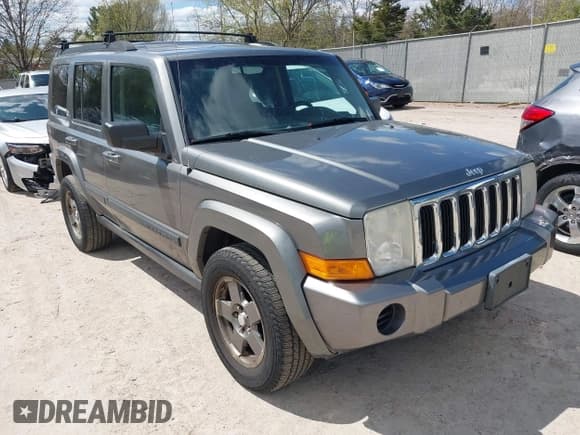 ✅ 2007 Jeep Commander Sport • VIN: 1J8HG48P87C647870 • Lot: 42185954. Listed on IAAI with 269,402 mi. Free auction sales archive from the USA and detailed vehicle history report at DreamBid. Image 1.
