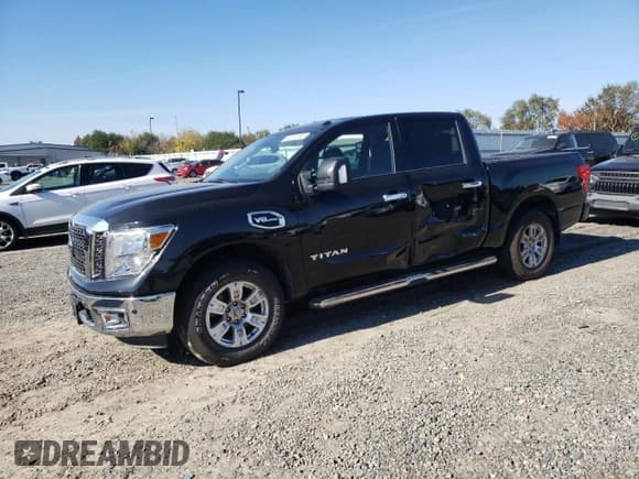 ✅ 2017 Nissan Titan Pro-4X • VIN: 1N6AA1E59HN570084 • Лот: 90293395. Опубликован ранее на Copart с пробегом 126 506 миль. Бесплатный доступ к архиву аукционных продаж из США и подробный отчёт об истории автомобиля на DreamBid. Изображение 1.