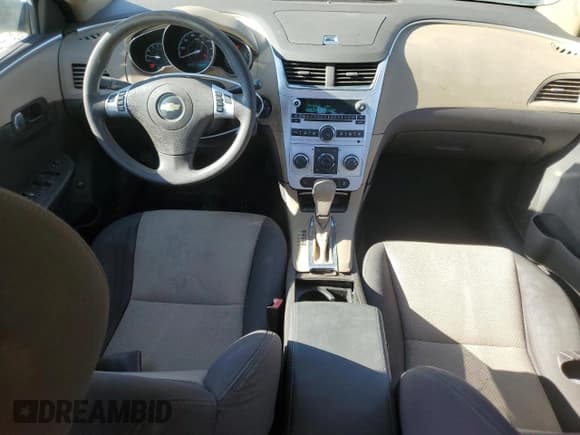 ✅ 2012 Chevrolet Malibu 1LS • VIN: 1G1ZB5E03CF260278 • Lot: 77217114. Listed on Copart with 148,952 mi. Free auction sales archive from the USA and detailed vehicle history report at DreamBid. Image 8.