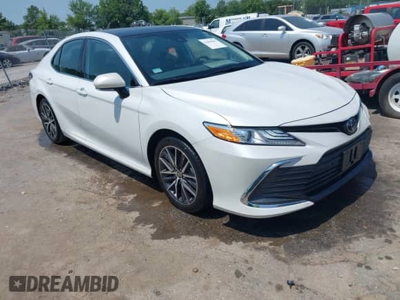 2022 Toyota Camry XLE with VIN 4T1F11AK2NU710770, listed as a IAAI auction lot 42604063 with 5,840 mi miles and . Bid and sale history available at DreamBid. Image 1.