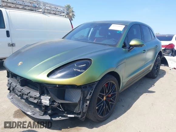✅ 2023 Porsche Macan GTS • VIN: WP1AF2A52PLB57660 • Lot: 43334916. Listed on IAAI with 22,831 mi. Free auction sales archive from the USA and detailed vehicle history report at DreamBid. Image 2.