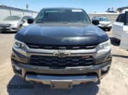 ✅ 2021 Chevrolet Colorado 4WD Z71 • VIN: 1GCGTDEN7M1128060 • Лот: 66130584. Опубликован ранее на Copart с пробегом 88 935 миль. Бесплатный доступ к архиву аукционных продаж из США и подробный отчёт об истории автомобиля на DreamBid. Изображение 5.